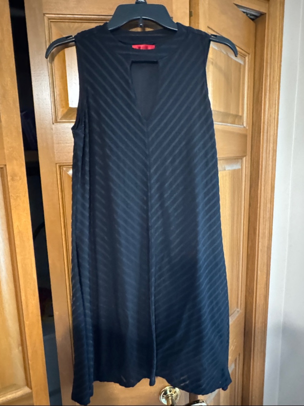 Jennifer Lopez Black Sleeveless Midi Dress with V-Keyhole
